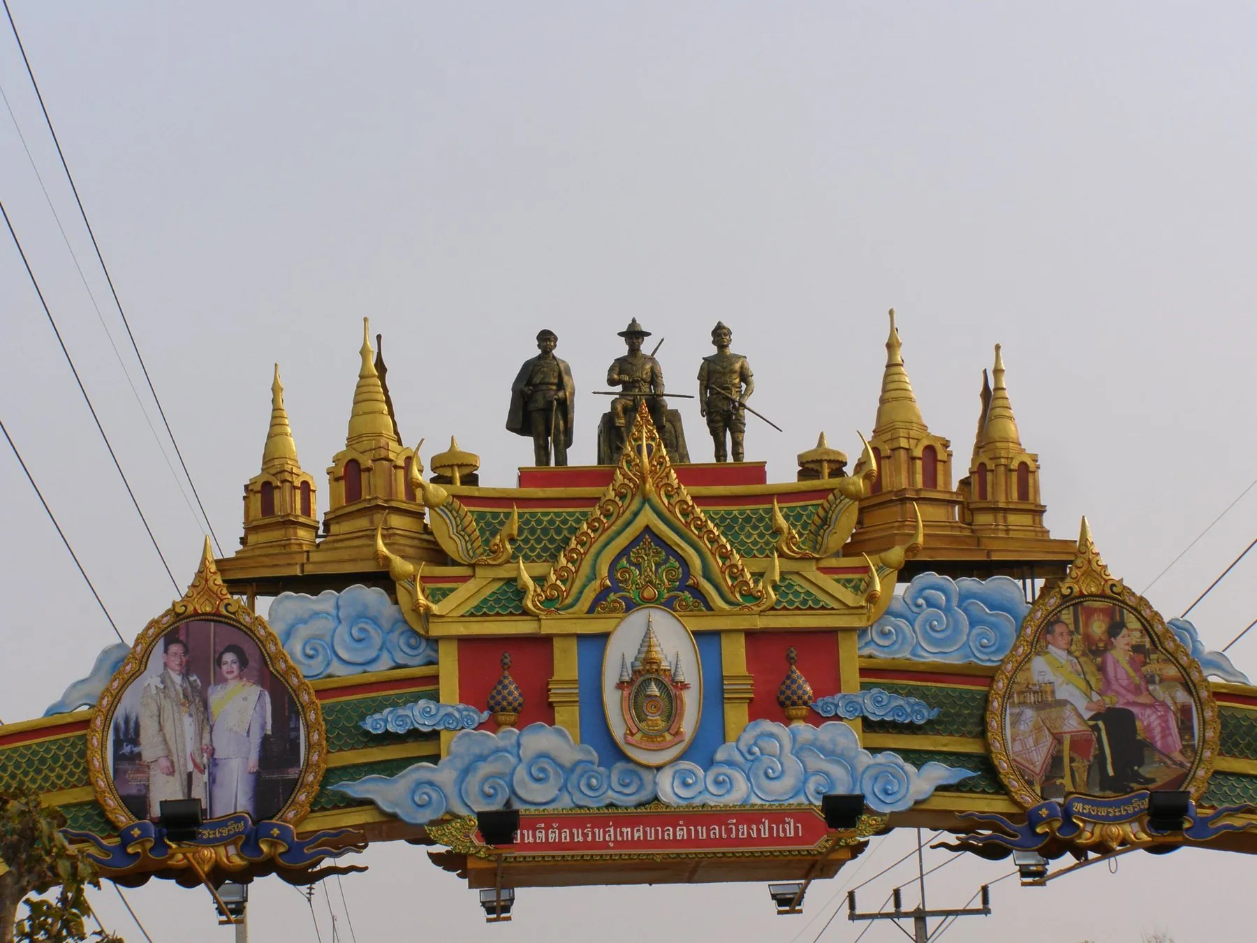 A decorated roadside gateway beside Highway 118 at Wiang Pa Pao in Chiang Rai province