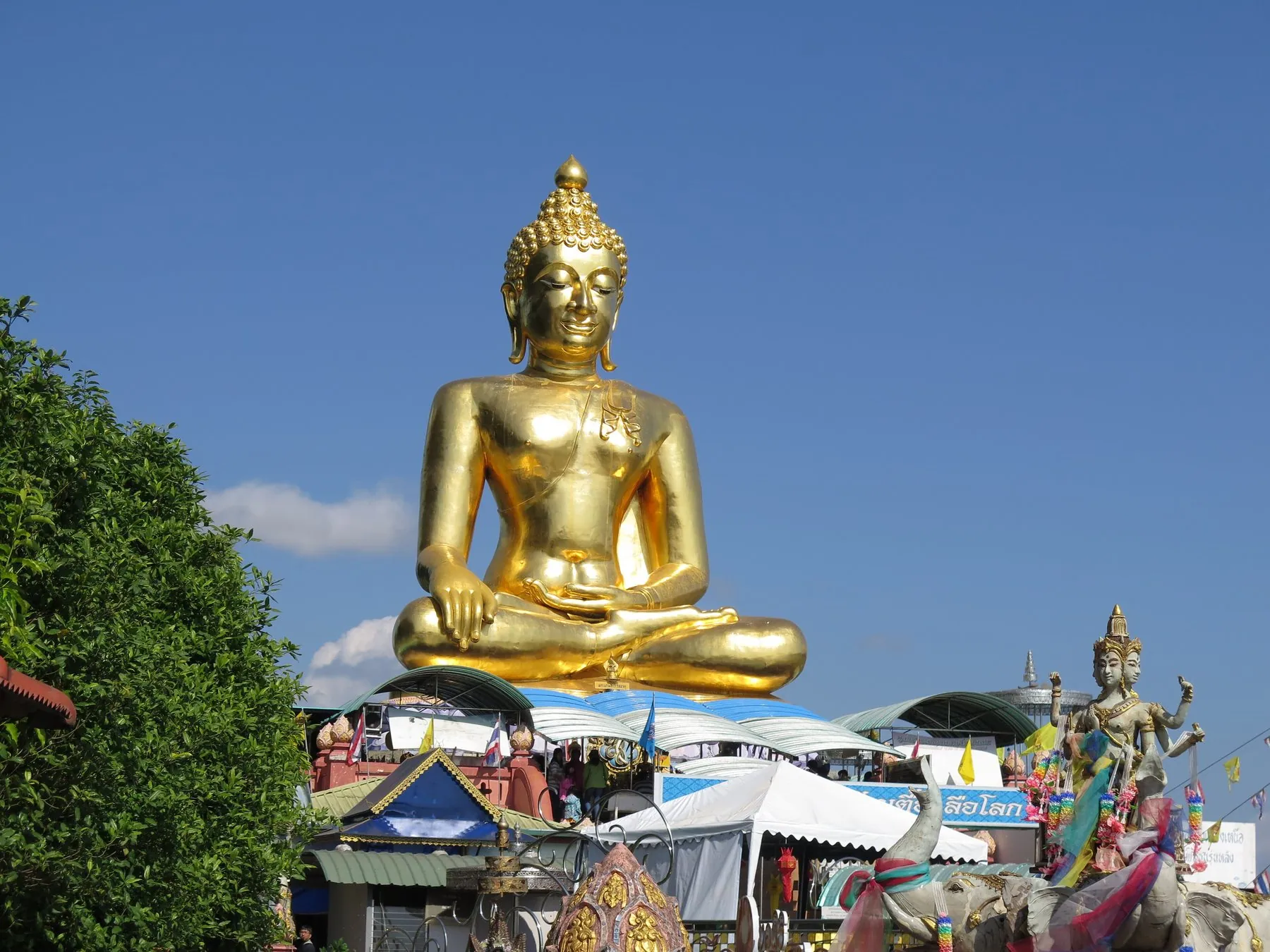 The large golden seated Buddha above the Mekong at Sop Ruak in the Golden Triangle