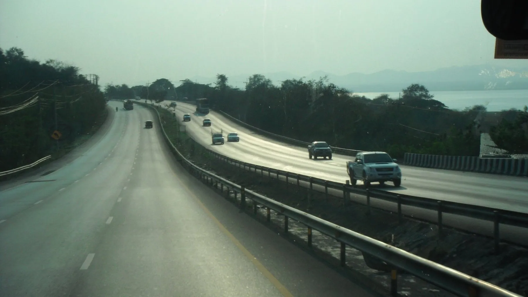 The Mittraphap road, Highway 2, running through open country near the Lam Takhong reservoir in Nakhon Ratchasima