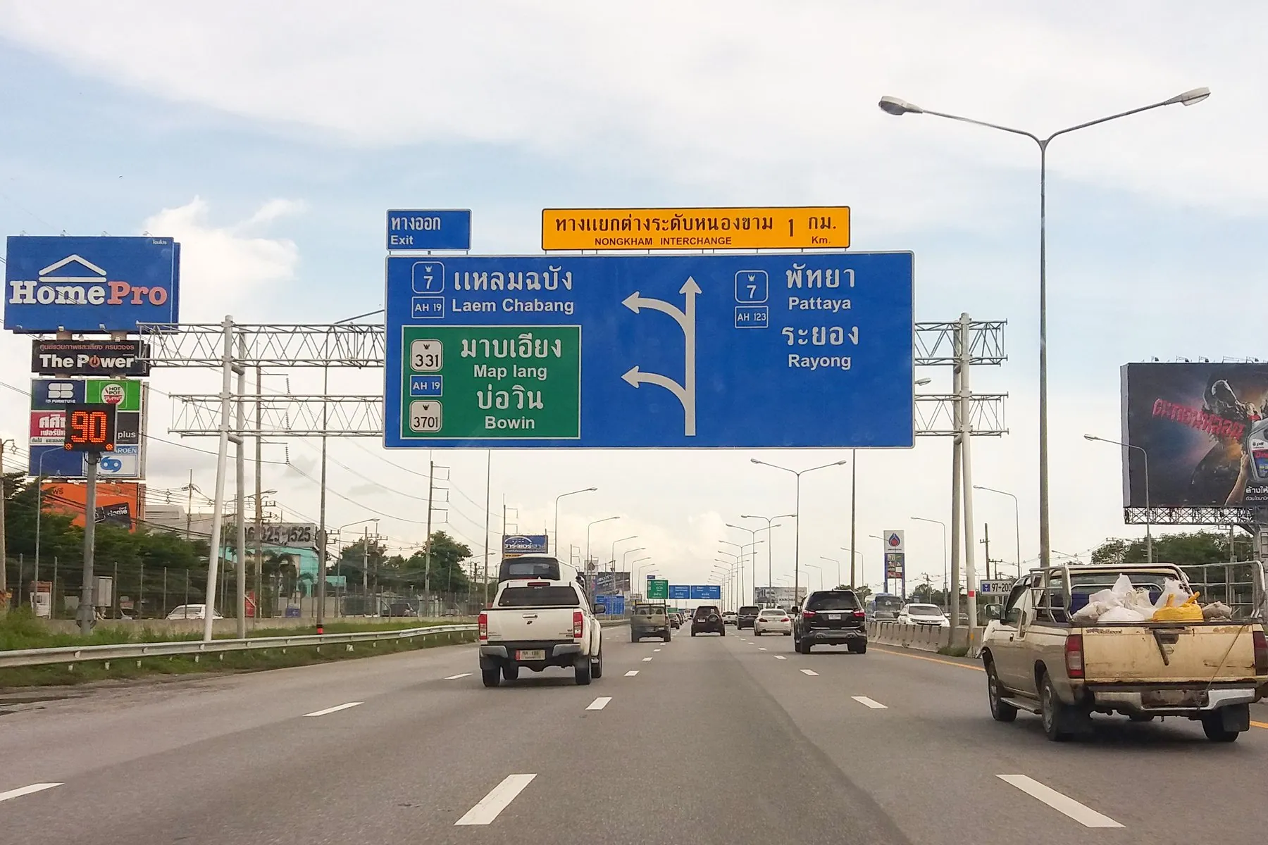 A sign gantry spanning the Thai motorway at Nong Kham interchange on the Pattaya-bound carriageway