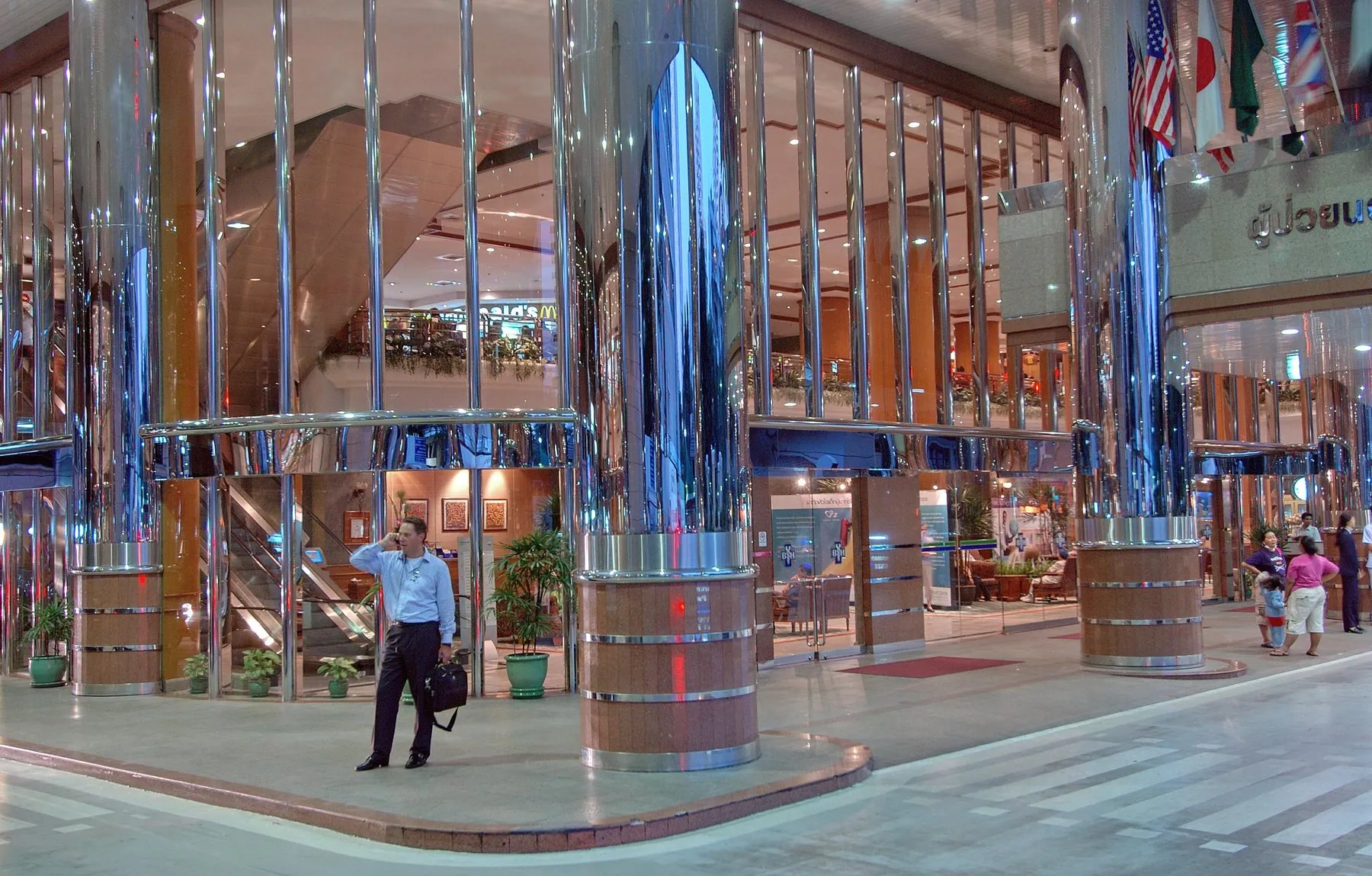 The glass and marble entrance atrium of a large private hospital in Bangkok